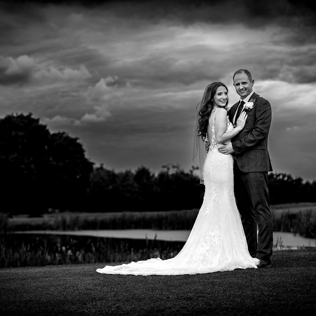 Bride and groom at Carden Park on golf sourse
