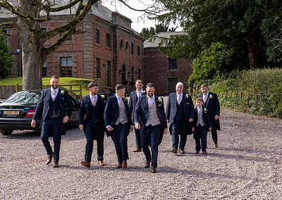 Groom and groomsmen arrive at Soughton Hall