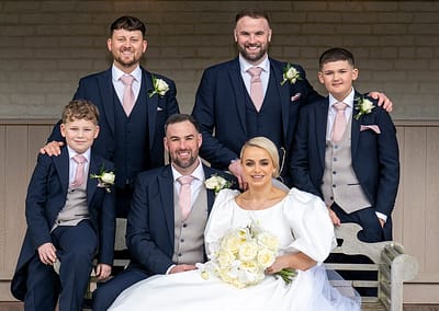 Bride and groom with best man and groomsmen at Soughton Hall